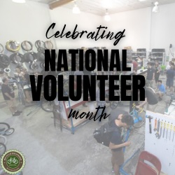 Celebrating National Volunteer Month superimposed over a high and wide view of the shop with volunteers working