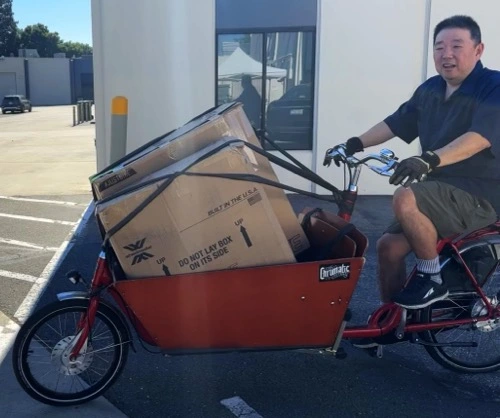Man riding a cargo bike