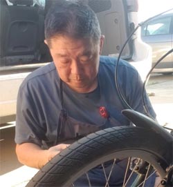 Man repairing a bike