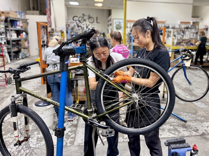 Women repairing bikes at SVBE Women's Night
